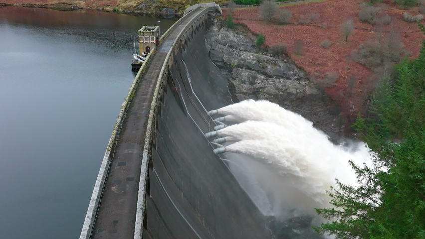 Water Being Pumped Through a Gravity Fed Hydroelectric Power Station Dam Royalty-Free Stock Footage #1087321304