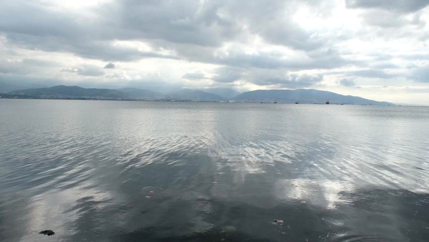 sea and cloud, calm sea and dense clouds, seascape