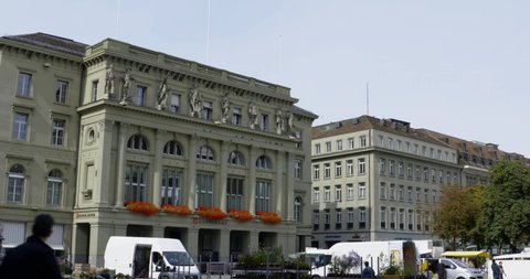 BERN, SWITZERLAND - Aug 2021: Pan right to the building of Schweizerische Nationalbank or Swiss National Bank