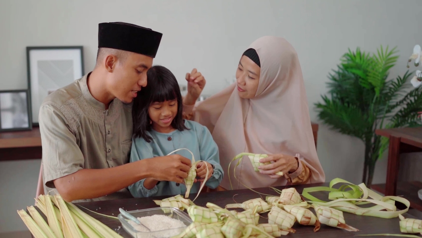 muslim asian family making ketupat for eid mubarak together Royalty-Free Stock Footage #1087332767