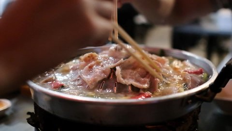 Thai Style BBQ (Moo Kra Ta) Close Up Footage