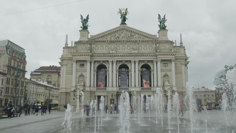LVIV, Ukraine - September 22nd 2021: Camera tracks past new fountain at Lviv Opera House, Ukraine