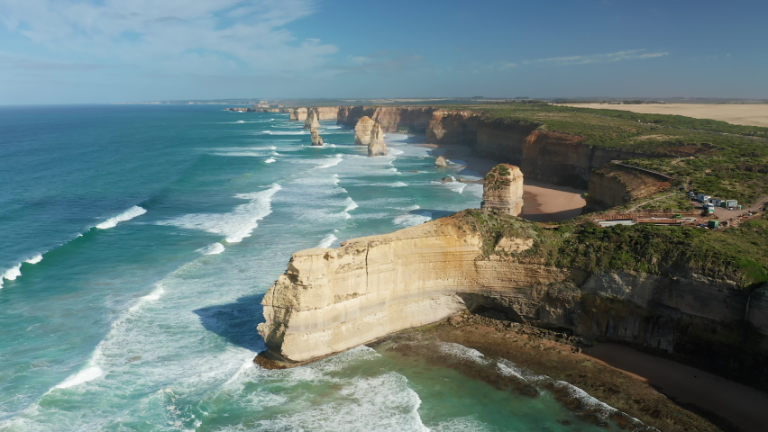 Aerial shot of Twelve Apostles along the Great Ocean Road in Australia Royalty-Free Stock Footage #1087354565