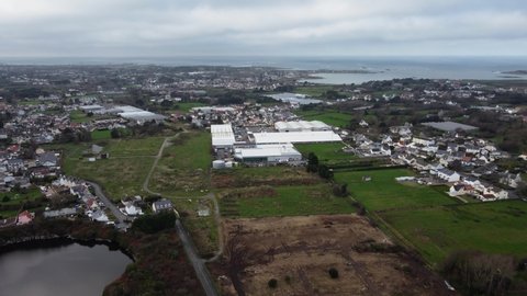 The Saltpans development site Guernsey and Braye Road Industrial Estate flying east to west with west coast of Guernsey in the background