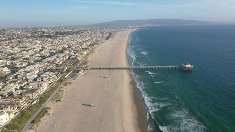 Aerial View Of Sandy Beach With Pier And Aquarium - Manhattan Beach In California - drone shot