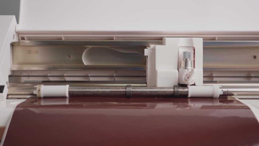 cutting plotter cuts out pattern on Stock Footage Video (100% Royalty ...