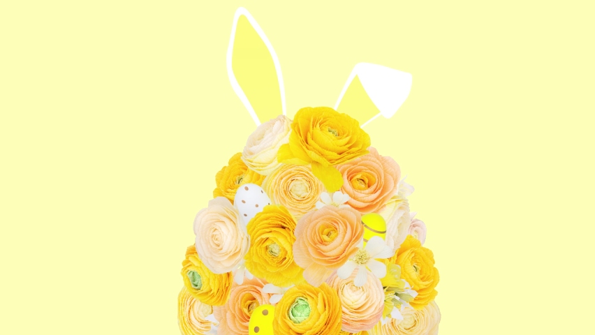 Easter egg being shaped of yellow spring flowers and bunny ears appear behing the egg. Egg hunt concept