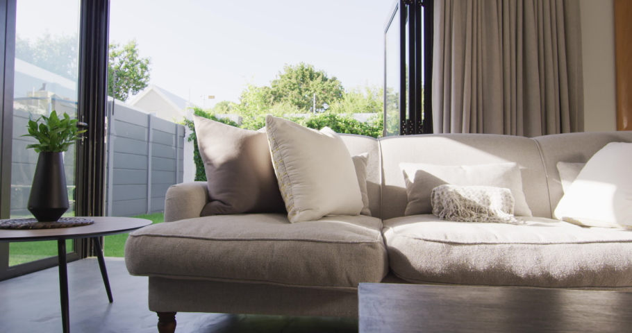 General view of luxury living room with sofa and table. interior design and home decoration concept.