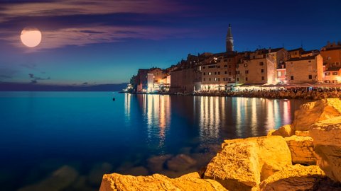 Rovinj old town skyline aerial view time lapse church cathedral sea view croatia city night view. Rivigno night old town.