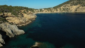 Aerial video of Cala Boix beach, in Santa Eulalia, Ibiza. Drone footage.