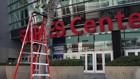 Los Angeles, California.
United States of America. 
December 6th, 2021.

Crews work to remove the Staples Center sign.