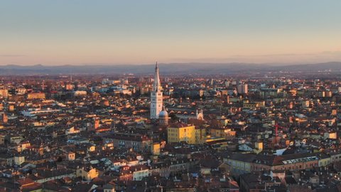 modena city skyline cityscape aerial view panoramic wide shot at sunset