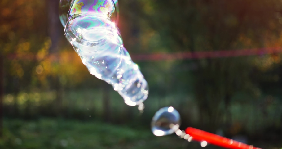 Colorful soap bubble flying, happiness and playful mood concept, slow motion 4k footage | Shutterstock HD Video #1087388780