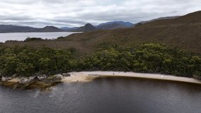World heritage mountains and river in a national park	, in tasmania Australia.
