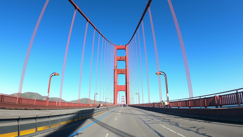 POV crossing the Golden Gate Bridge. Royalty-Free Stock Footage #1087389992