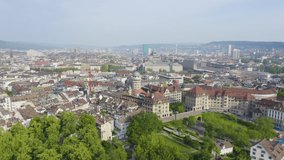 Inscription on video. Zurich, Switzerland. Panorama of the city from the air. Urania Sternwarte Observatory, Lindenhof City Park. Text from small balls, Aerial View