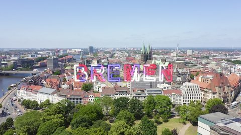 Inscription on video. Bremen, Germany. The historic part of Bremen, the old town. Bremen Cathedral ( St. Petri Dom Bremen ). View in flight. Glitch effect text, Aerial View