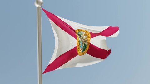 Florida flag on flagpole. FL flag fluttering in the wind. USA.