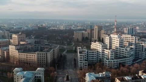 Monolithically structured Concrete building Derzhprom of constructivism style: aerial drone panorama shot in the center of Kharkiv, Ukraine. Derzhprom building - symbol of constructivism in Kharkiv.