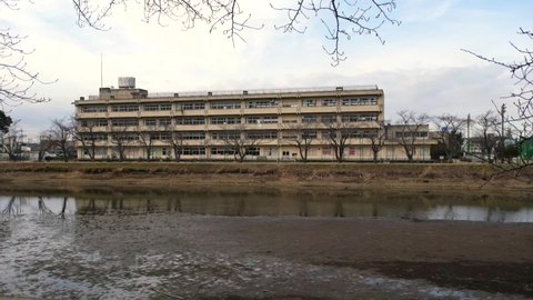 Kasukabe, Saitama, Japan. February 8, 2022. Kasukabe Municipal Midori Junior High School during the COVID-19. Main classrooms, Furutone River