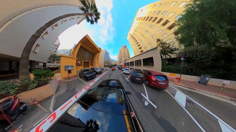 Streets of Monte Carlo. Super wide angle. Video distortion. Panorama. Small sphere. Blue sky with white clouds. Time interval. France. Fashion. tourism. Monet Carlo February 2022 