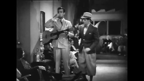 CIRCA 1933 - In this adventure movie, a cop provides intimidating lyric suggestions to a drunken sailor.