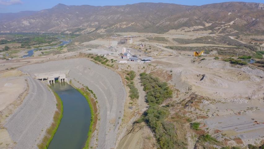 Aerial forward over Monte Grande dam during construction work, Dominican Republic
