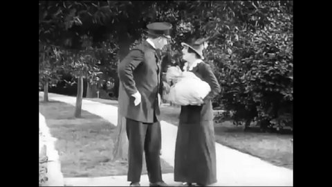 CIRCA 1914 - In this silent comedy, a woman beats up her husband (Charlie Chaplin) and the woman she mistakes for his mistress in a public park.