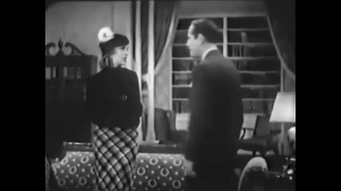 CIRCA 1936 - In this mystery movie, a detective is annoyed when his girlfriend comes to confess something.