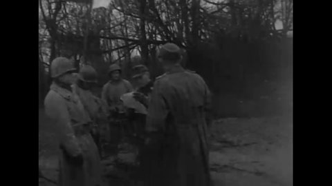 CIRCA 1944 - A Nazi officer speaks with American officers about the surrender of Fort Joan of Arc.
