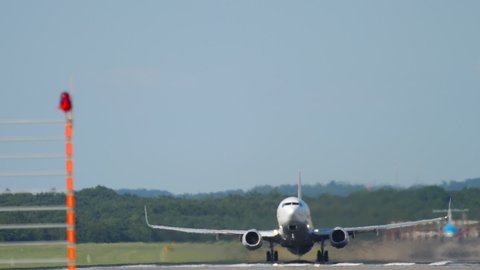 DUSSELDORF, GERMANY - JULY 21, 2017: Boeing 737 Pegasus Airlines takes off, retracts landing gear and flies overhead at Dusseldorf Airport