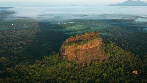 Aerial view of sunrise over the famous Sigiriya Rock Fortress called Lion Rock, Sri Lanka