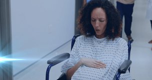 Animation of light spots over biracial pregnant woman with nurse and husband in hospital. maternal mental health awareness week concept digitally generated video.