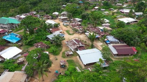 France, French Guiana, Saint Laurent du Maroni, drone aerial view above slums and shantytown. Many car wrecks in the middle of the houses.