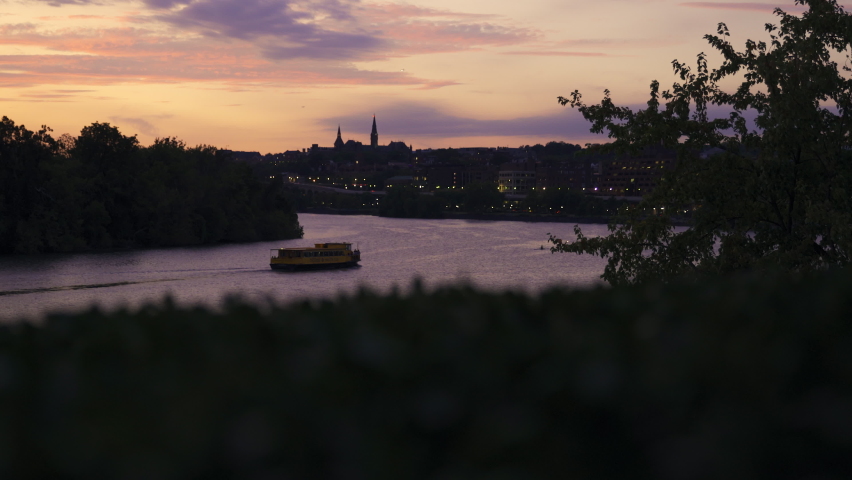 Yellow Boat on the Potomac River Near Georgetown in Washington DC at Sunset