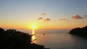 aerial view the yellow sun going down to the sea above the ocean.
Nature video High quality footage emerald green waters of the Andaman Sea.
Scene of Gradient color romantic sky sunset background. 