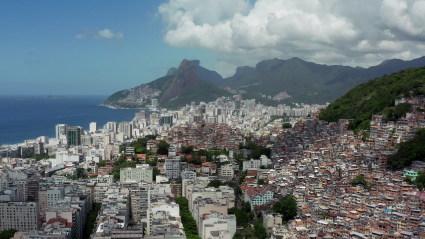 Aerial view Rio de Janeiro Brazil cityscape. Downtown favelas and beautiful mountain landscape with Atlantic coast. Royalty-Free Stock Footage #1087519016