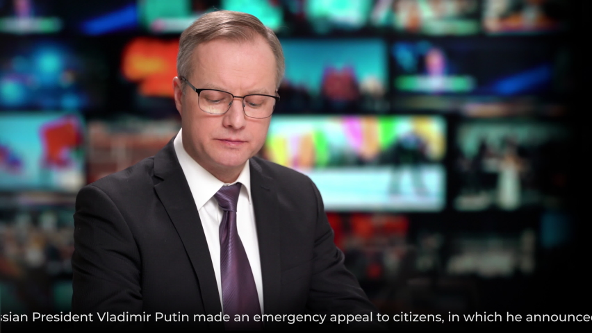 TV news studio male anchor presenter talking shocking breaking news about Russia's attack on Ukraine Royalty-Free Stock Footage #1087523558