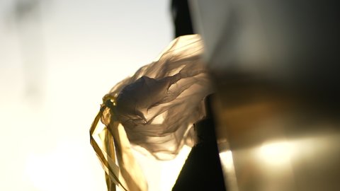 Plastic trash bag outside waving in the wind