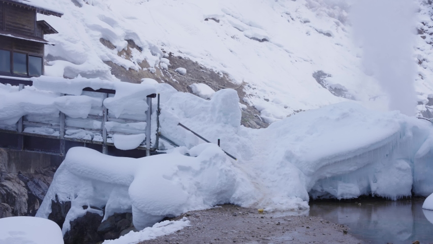 Hot Spring Geyser in Snow Landscape of Yamanouchi, Nagano Japan