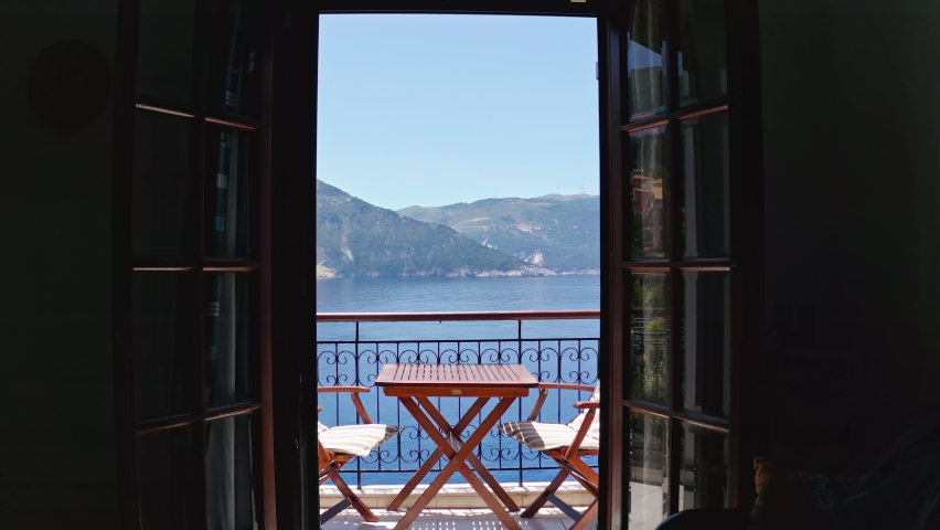View of Mediterranean sea through window of hotel in Kefalonia Greece Royalty-Free Stock Footage #1087537085