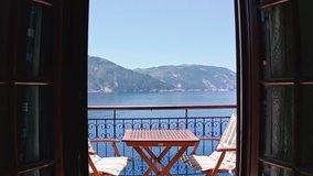View of Mediterranean sea through window of hotel in Kefalonia Greece - Powered by Shutterstock - Get 15% off with code: PIKWIZARD15