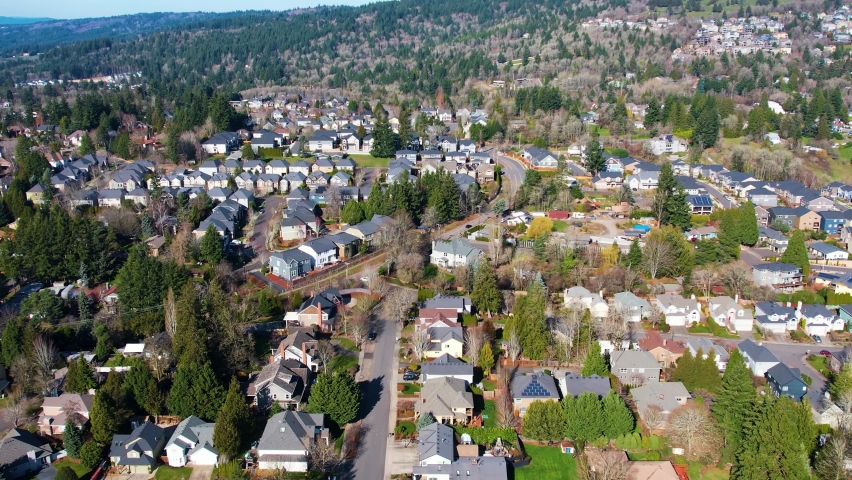 4K aerial drone shot overlooking Suburban neighborhood houses in Portland, Oregon.