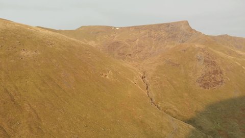 Lake District. Cumbria. April. 16. 2022. England. Flying towards Blencathra Mountain drone footage
