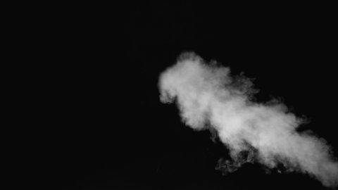 White water vapour on a black background. Close-up shot 4k