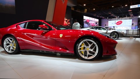 BRUSSELS, BELGIUM - JANUARY 10, 2018: Ferrari 812 SuperfastV12 front mid-engine, rear-wheel-drive exclusive Grand Tourer sports car on display at the 2018 European motor show in Brussels.