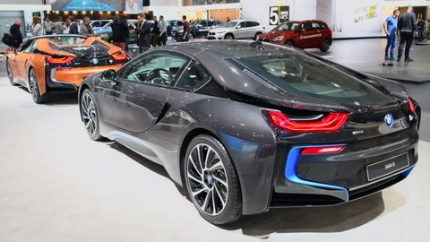 BRUSSELS, BELGIUM - JANUARY 10, 2018: BMW i8 and i8 Roadster plug-in hybrid luxury convertible sports cars on display at the 2018 European motor show in Brussels.