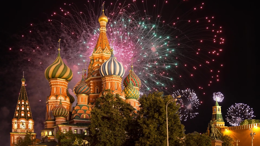 Celebratory colorful fireworks and Cathedral of Intercession of Most Holy Theotokos on the Moat ( Temple of Basil the Blessed),  Red Square, Moscow, Russia