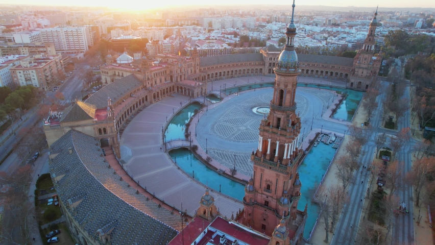 sunrise over Plaza de Espana in Seville, aerial view of famous Seville landmark, high angle view of downtown Seville, drone shot of Seville skyline. High quality 4k footage