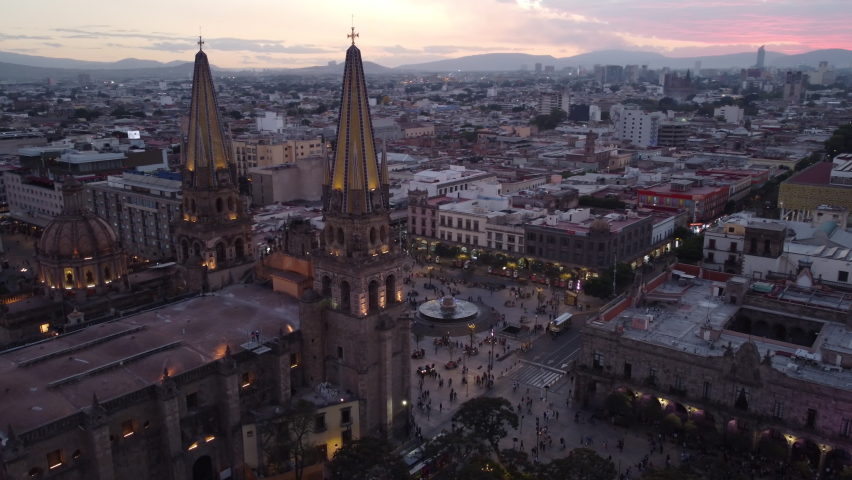 dusk flying counter clockwise around central plaza of Guadalajara Mexico Royalty-Free Stock Footage #1087581668